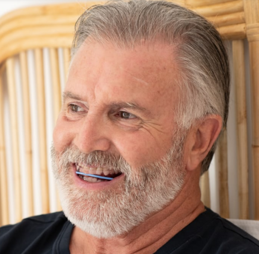 man happy from using oral appliance for sleep apnea